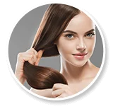Woman holding a length of strong, glossy hair